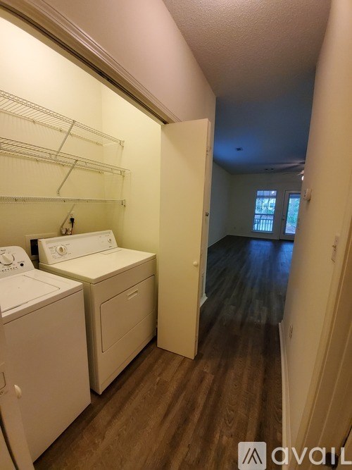 A laundry room with a washer and dryer.