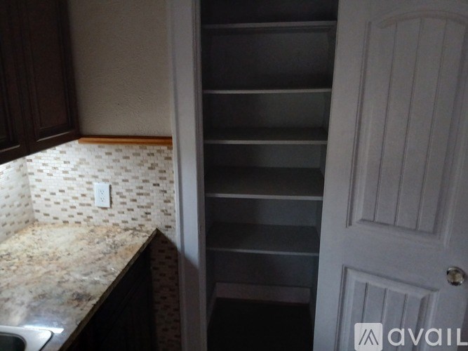 A white door is on the right side of the image.