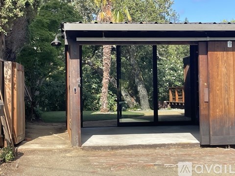A modern kitchen with white cabinets and a large island.