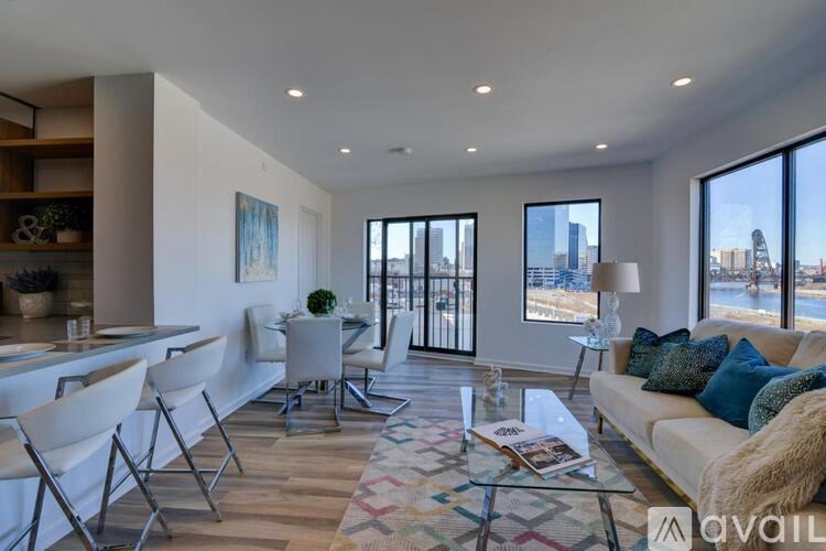 A modern living room with a view of the city.