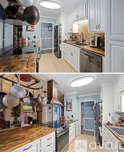 A kitchen with a wooden counter top and white cabinets.