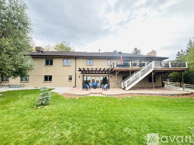 A house with a deck and a patio.