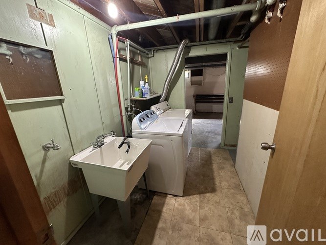 A bathroom with a sink and toilet in it.