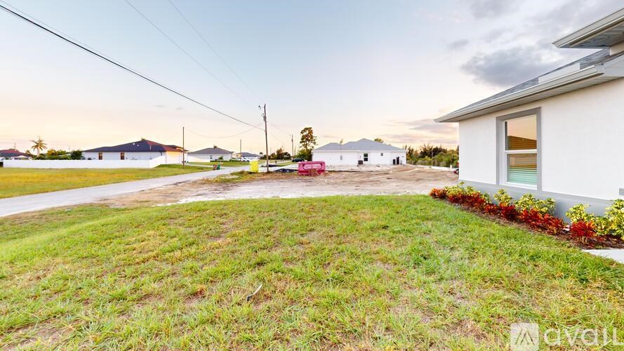 A house with a lawn in front of it is for sale.