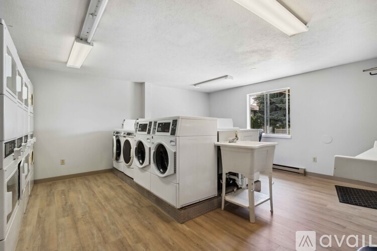 A laundry room with a washer and dryer.