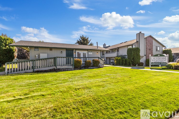 A building with a sign that says "Courtyard" in front of it.
