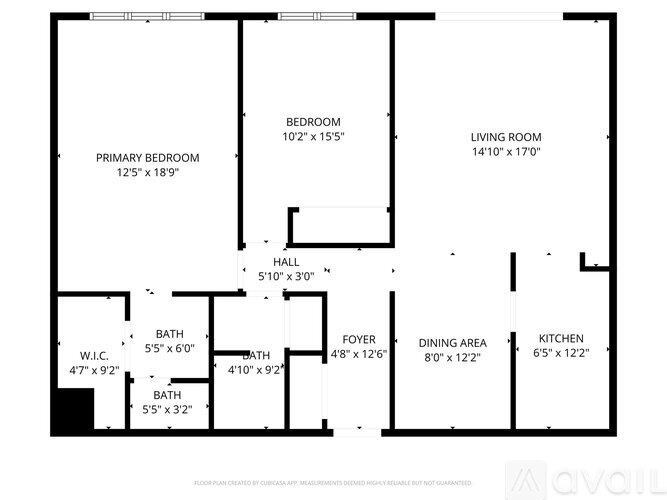 A floor plan of a house with a living room, two bedrooms, a bathroom, a dining area, a kitchen, and a foyer.
