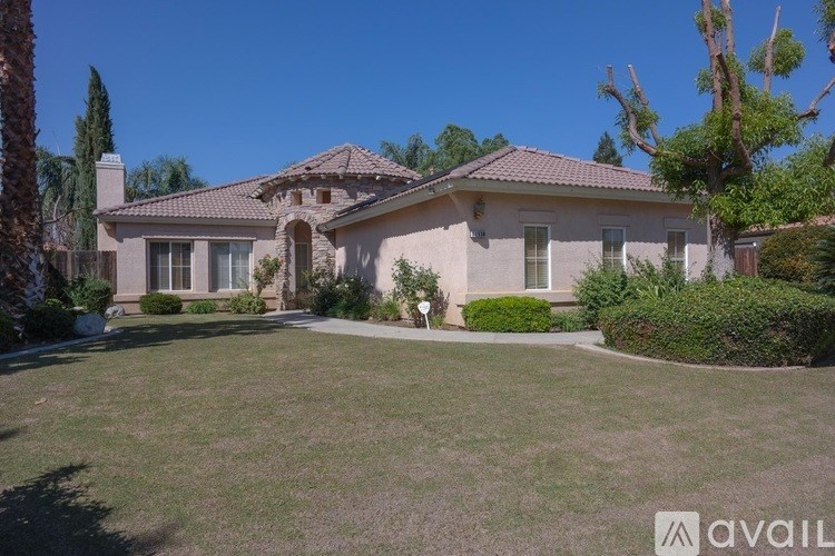 A house with a lawn in front of it is for sale.