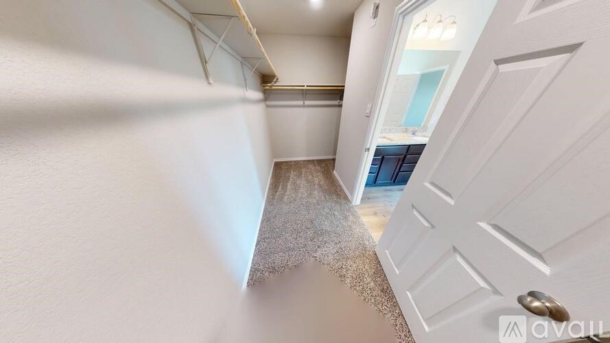 A white door is on the right side of the image.