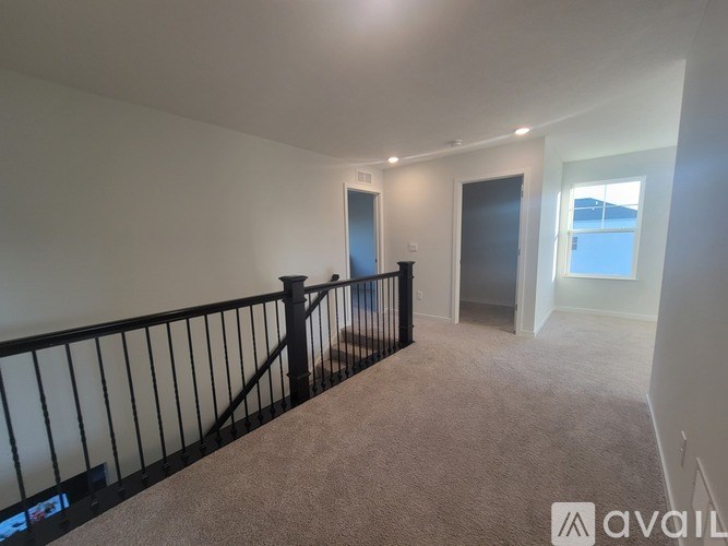 A kitchen with a sink and a window.