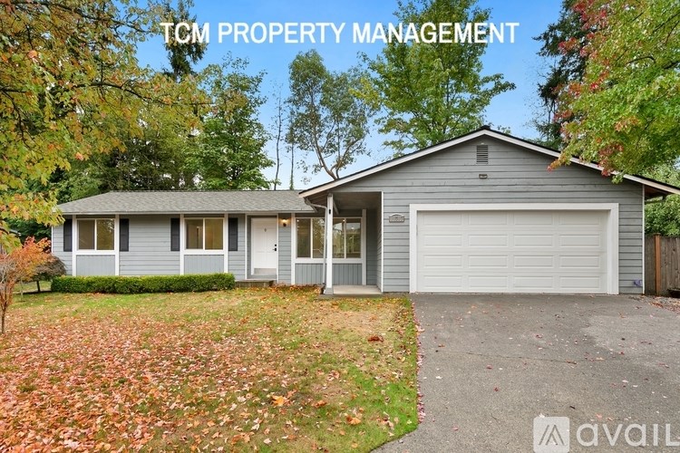 A house with the text "TCM PROPERTY MANAGEMENT" on the top left corner.