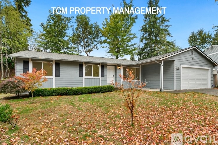 A house with the text "TCM PROPERTY MANAGEMENT" on the top.