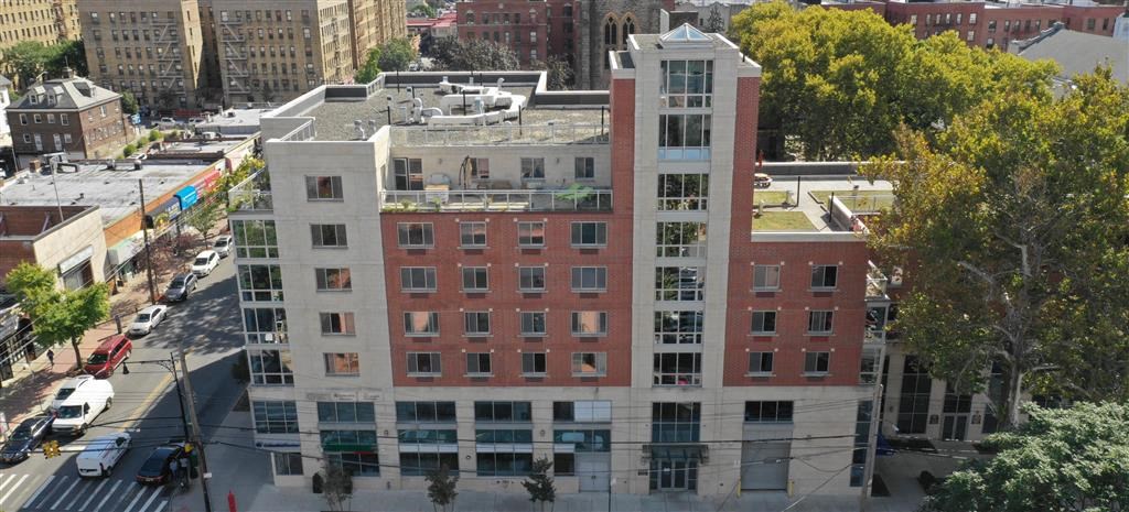 an aerial view of a building in a city