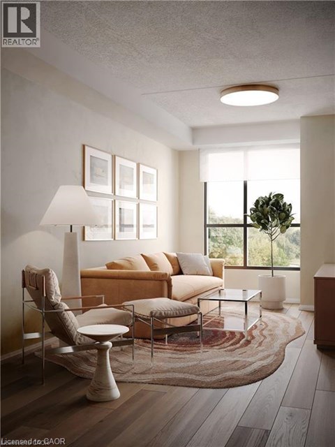 A modern living room with a sofa, chair, and lamp.