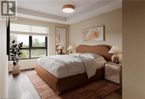 A bedroom with a large bed and a window overlooking a green landscape.