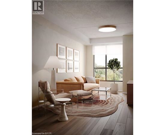 A modern living room with a sofa, chair, and lamp.