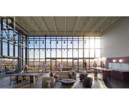 A group of people are gathered in a large room with a view of the city.