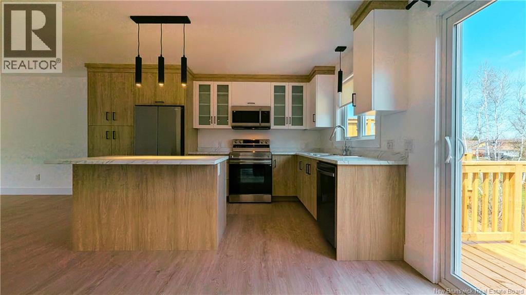 A modern kitchen with wooden cabinets and a large island.