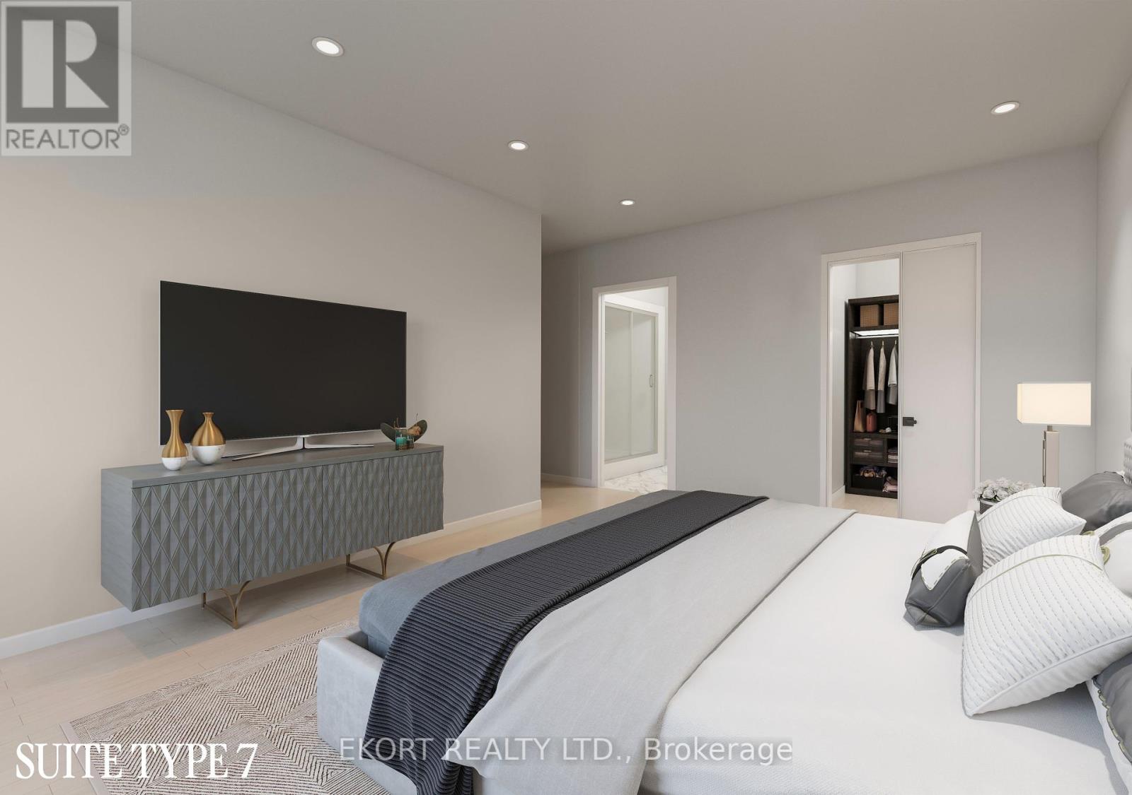 A bedroom with a bed, a television, and a grey storage unit.