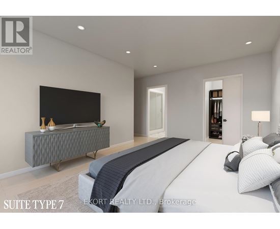 A bedroom with a bed, a television, and a grey storage unit.