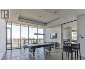 A modern dining room with a pool view.