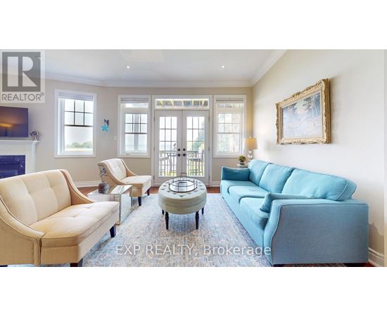 A living room with a blue couch and a coffee table.