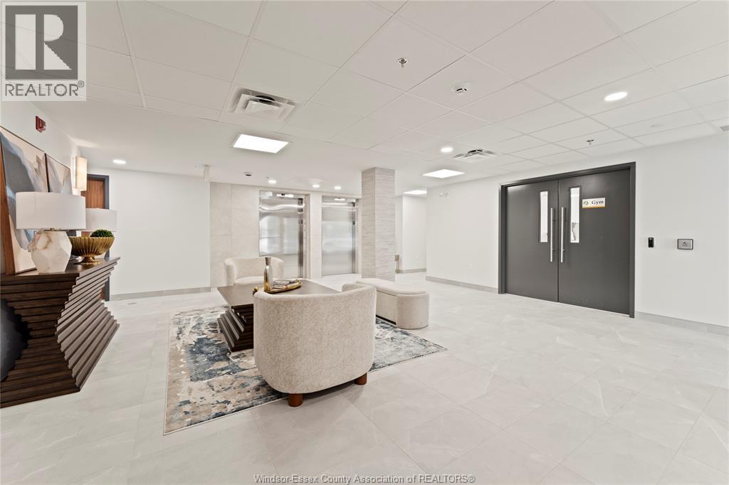 A spacious office room with a large table and chairs.