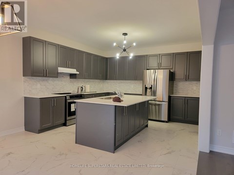 A kitchen with a marble floor and a white ceiling.