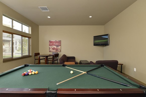 Pool Table with Seating and TVs Copper Trail Apartments | Apartments in Olympia, WA 