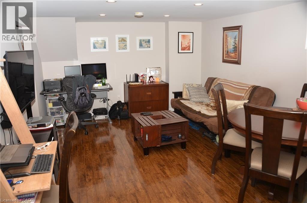 A living room with a couch, chair, and coffee table.