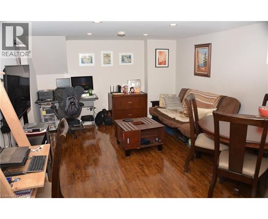 A living room with a couch, chair, and coffee table.