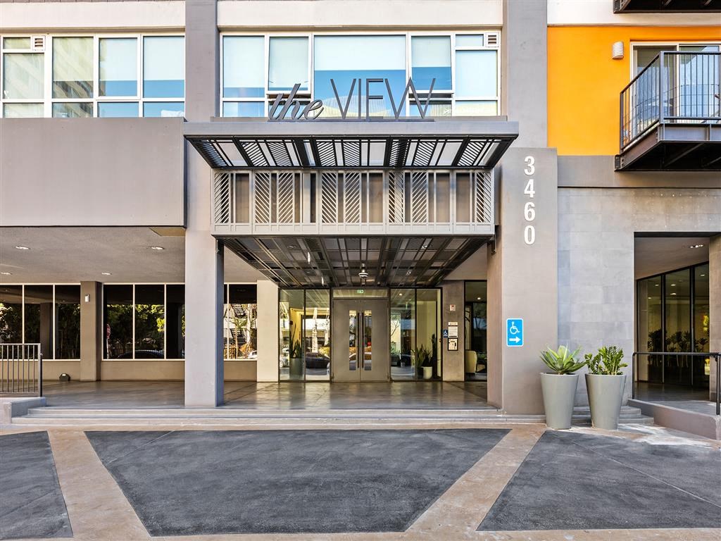 The entrance to a building with a glass door and a sign that reads "The View".