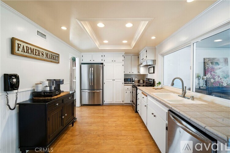 Source URL: https://prod-avail.s3.amazonaws.com/public_images/34145043/listing/OC22081275_2_0.jpg