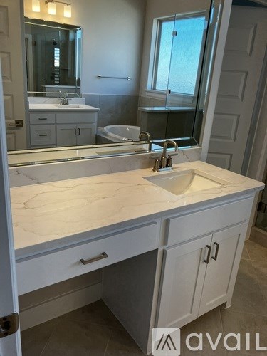 Source URL: https://prod-avail.s3.amazonaws.com/public_images/41499893/listing/primary_vanity_w-dressing_area.JPEG