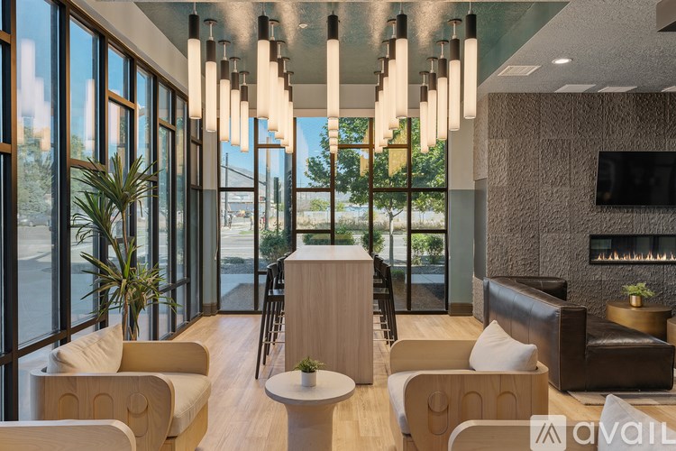 Source URL: https://prod-avail.s3.amazonaws.com/public_images/41503125/listing/Sevenotwmain_10172024_interior_with_windows.jpg