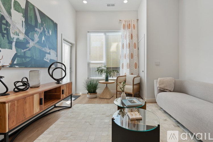 Source URL: https://prod-avail.s3.amazonaws.com/public_images/41503162/listing/Sevenotwmain_10172024_living_room_left_risde.jpg