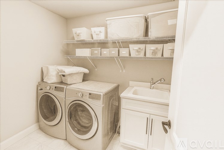 A room under construction with wooden beams and a ladder.