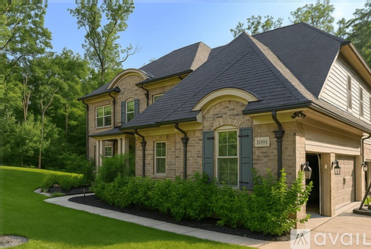 A large house with a stone facade and a dark roof.
