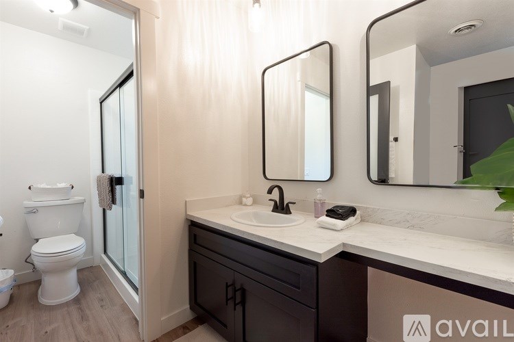 Source URL: https://prod-avail.s3.amazonaws.com/public_images/41489381/listing/21_Master_Bathroom_private_door_between_sink_and_bathroom.jpg