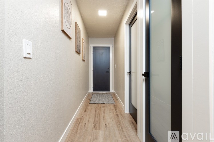 Source URL: https://prod-avail.s3.amazonaws.com/public_images/41494998/listing/39_Hallway_leading_to_garage.jpg