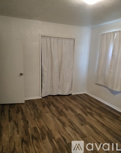 Source URL: https://prod-avail.s3.amazonaws.com/public_images/41504929/listing/5._Master_bedroom_with_closet_and_bedroom_door.jpg