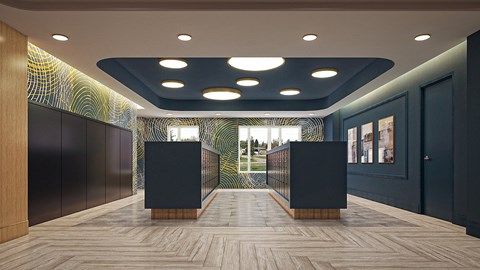 A hallway with two black podiums and a wooden floor.