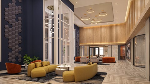 A modern living room with a yellow sofa and a glass door.