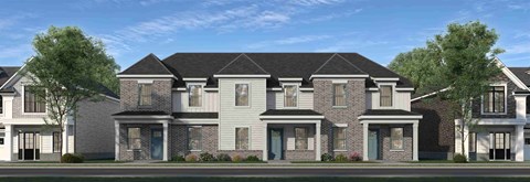 A large, modern house with a grey front yard.