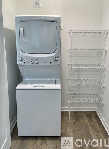 A white oven and microwave in a kitchen.