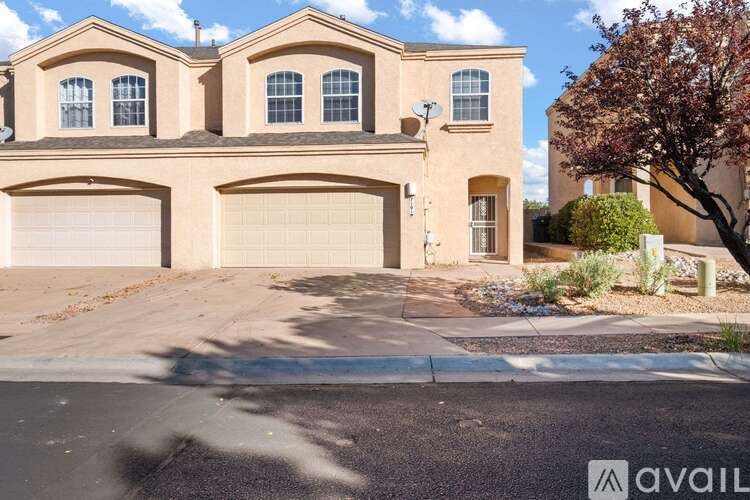 A house with a garage is for sale.