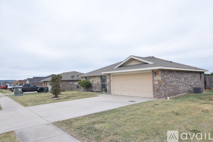 A house with a garage is available for sale.