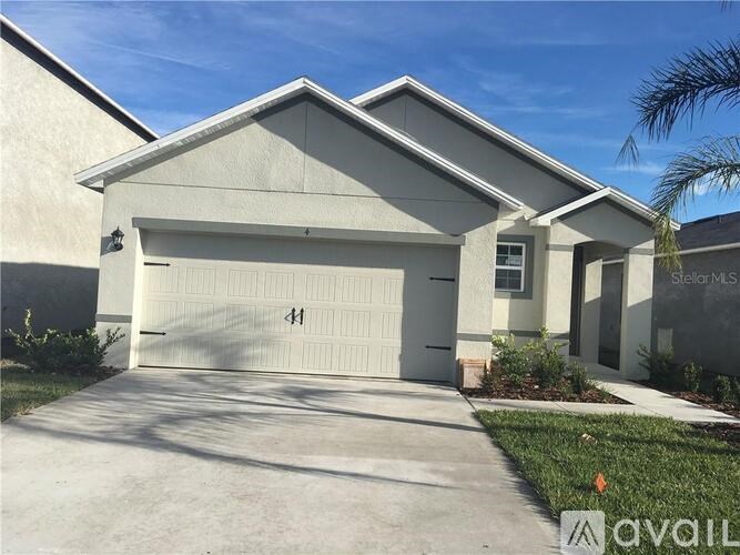 A two-car garage is attached to a house.