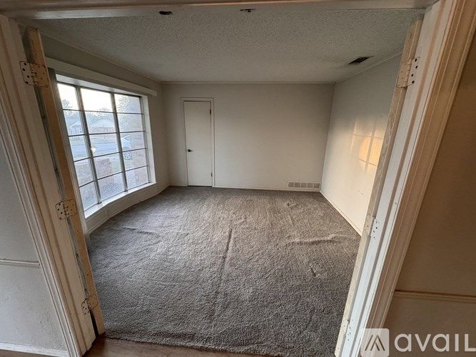 A floor plan of a building with multiple rooms and dimensions.