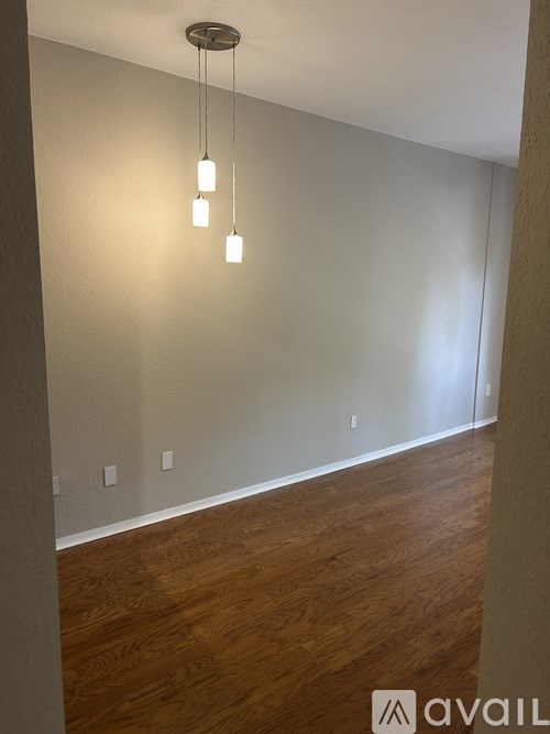 Empty white walk in closet with shelves.